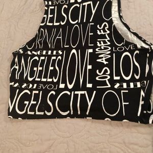 Cute B/W short stretch top by Love Culture. ‘M’